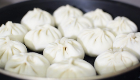 Put your baozi in a frying pan to fry them
